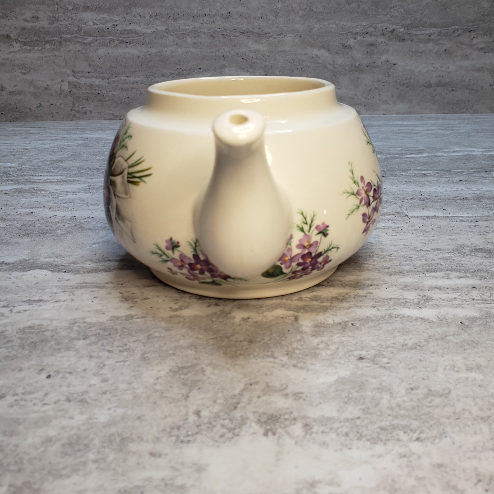 Floral Teacup and Teapot Set with Unique Handle