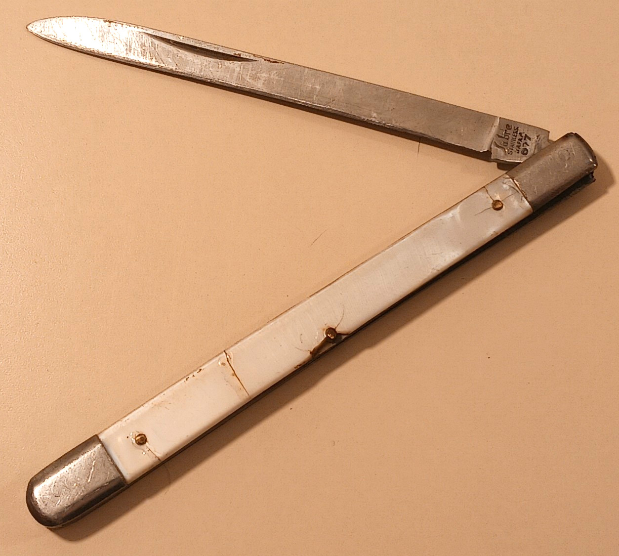 Sabre Stainless Steel Japan 677 Folding Fruit Melon Knife White Celluloid Handle