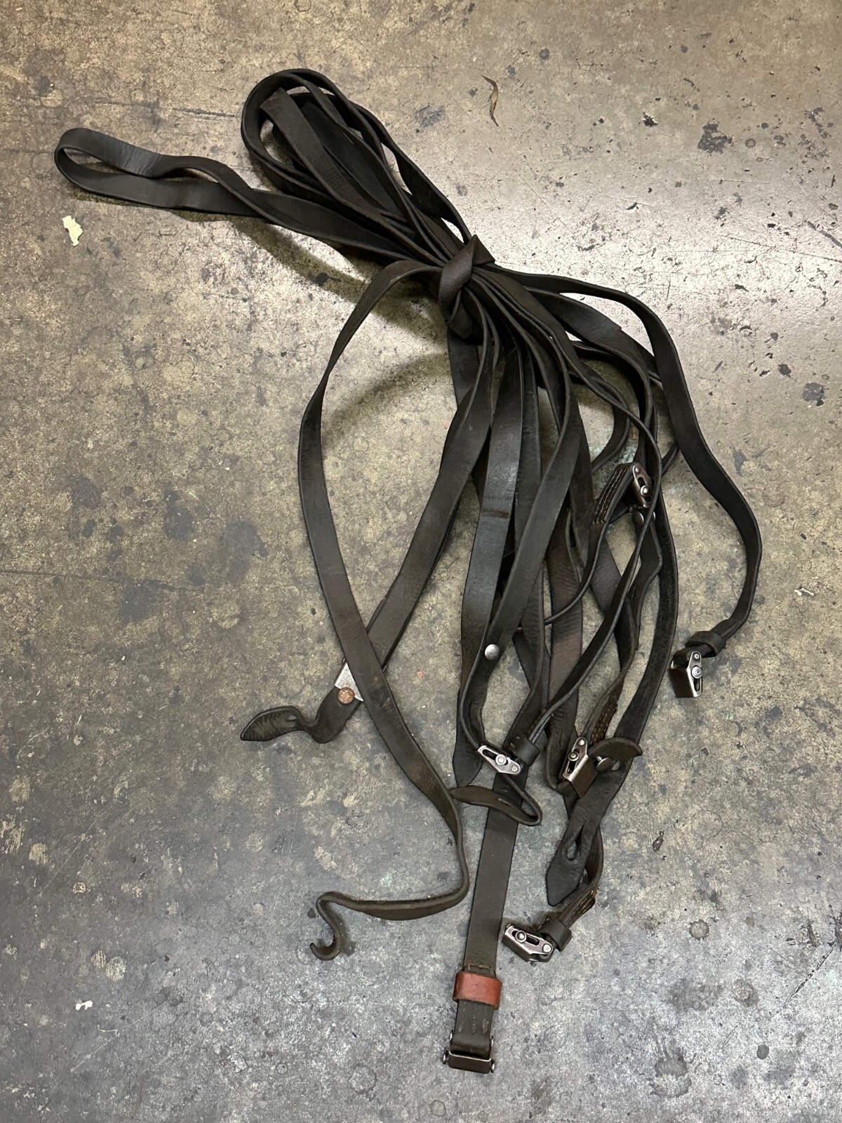 MAUSER 98K LEATHER SLING WITH  METAL BUTON. SOLD "AS IS".