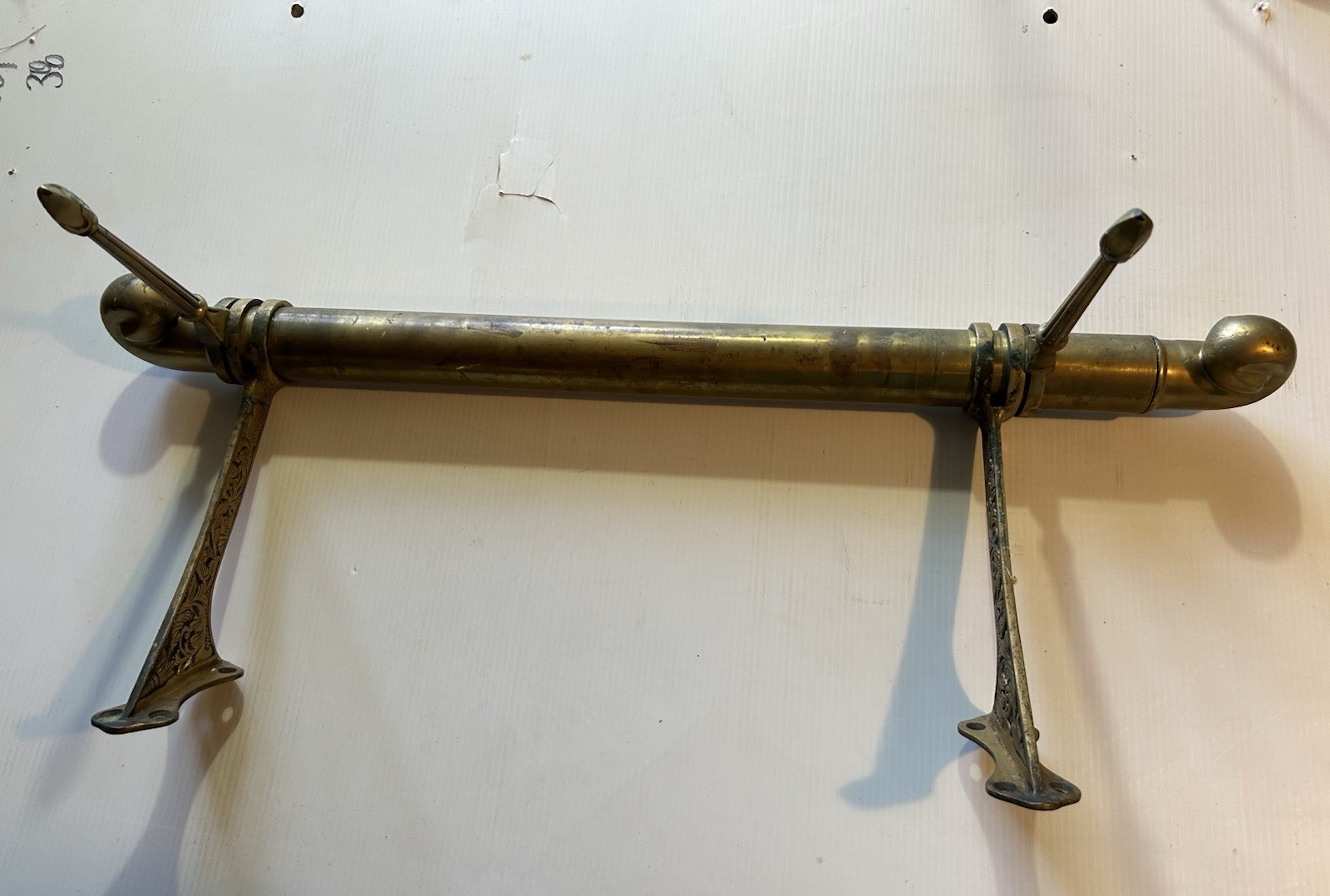 ANTIQUE BRASS BAR END RAIL AND FANCY DECORATED RAIL HANGERS