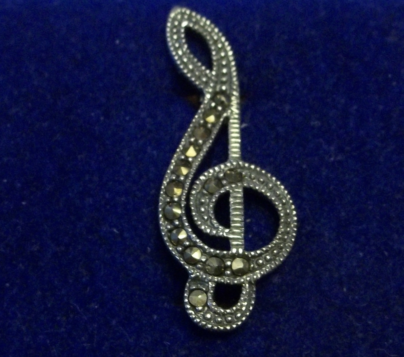 Sterling Silver 31x12mm Marcasite Treble Clef Music Pin
