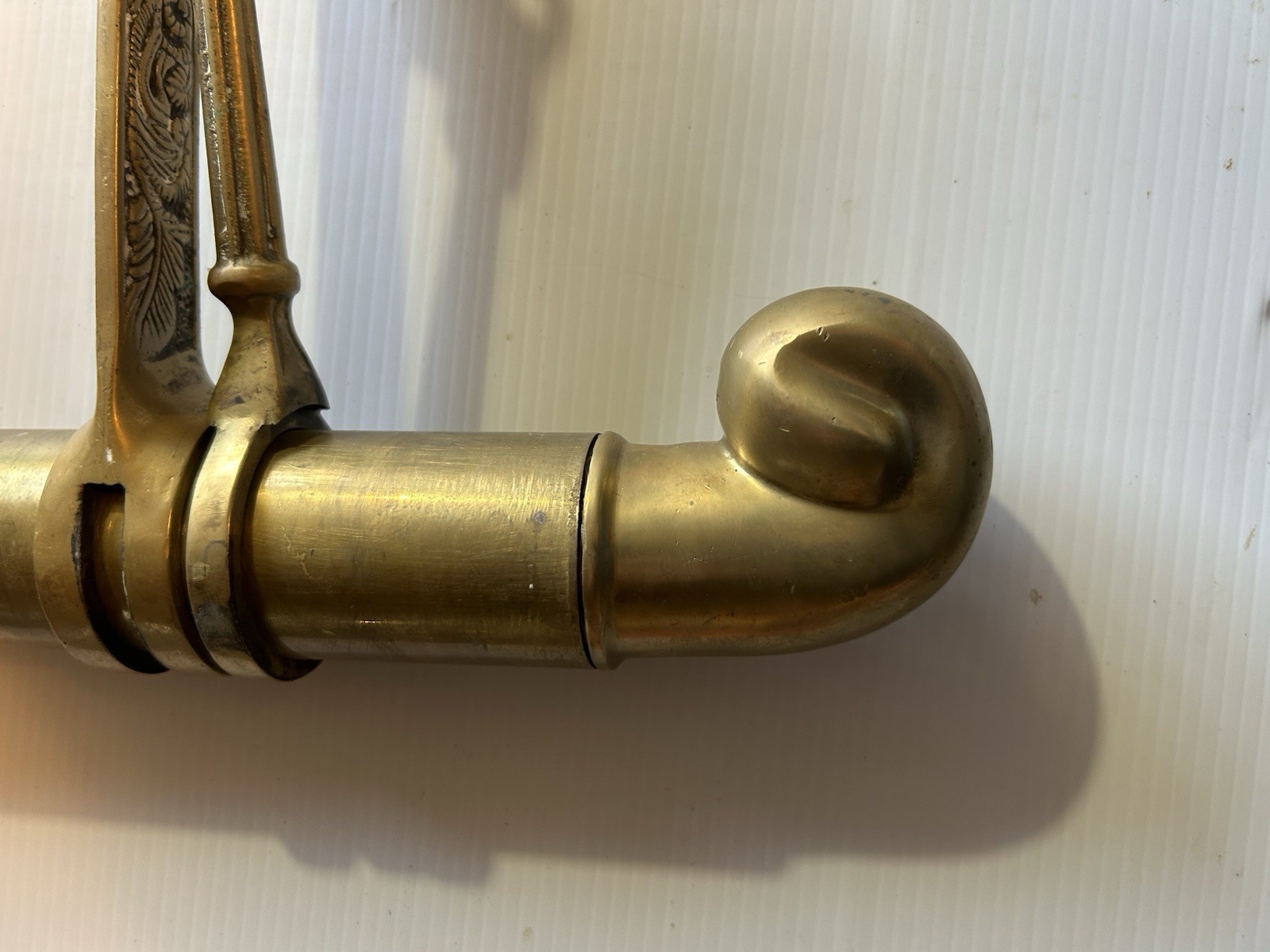 ANTIQUE BRASS BAR END RAIL AND FANCY DECORATED RAIL HANGERS