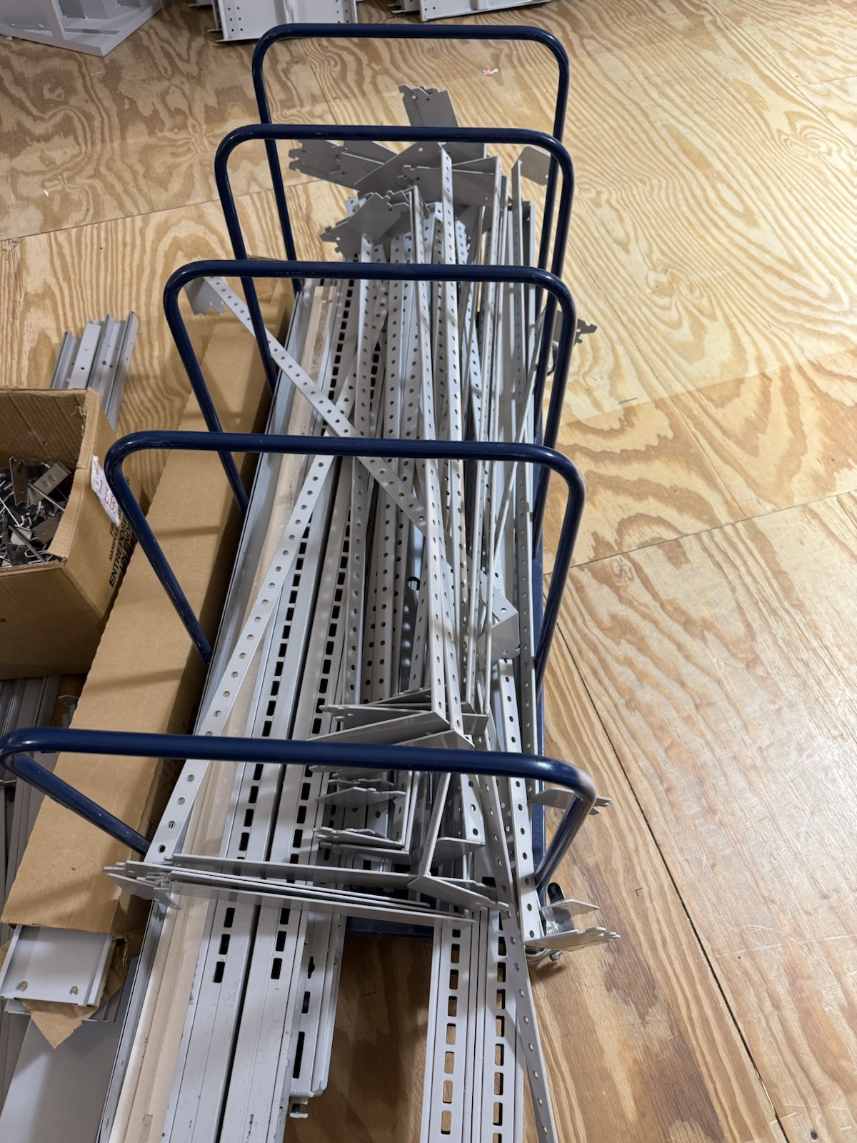 HUGE lot of pallets of Used Lozier Shelving shelves, components, glass cases