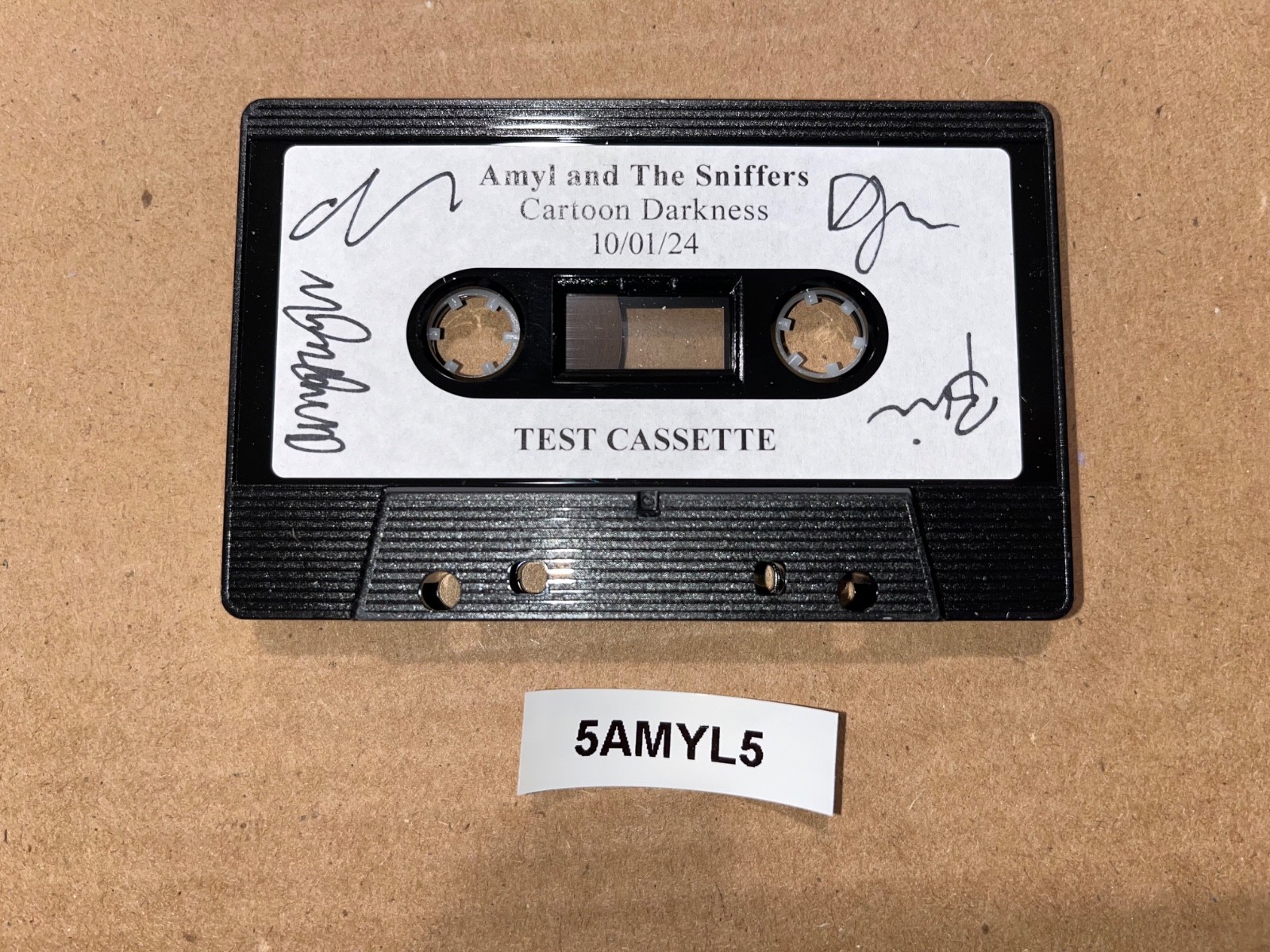Amyl And The Sniffers Signed Autographed Test Cassette Cartoon Darkness 10/01/24