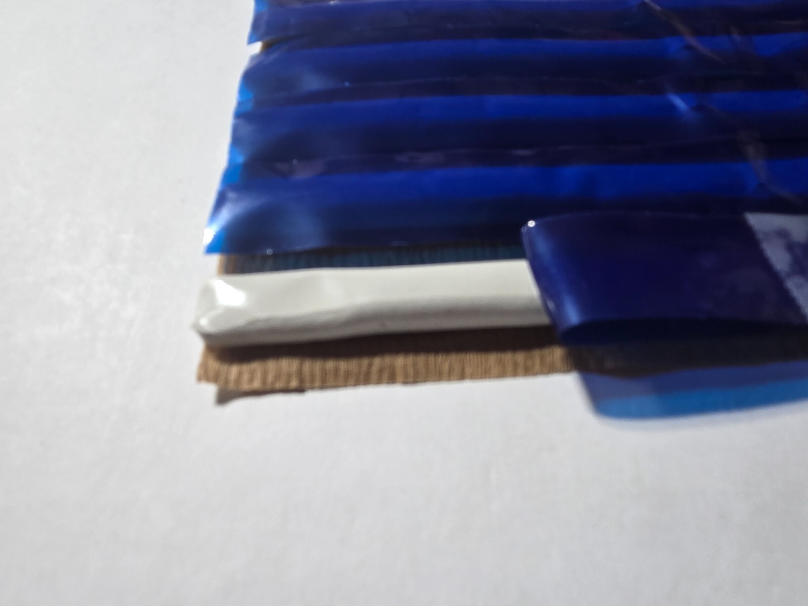 Mineral tack or putty for mounting mineral, fossil, gem specimens 75 gram pack.