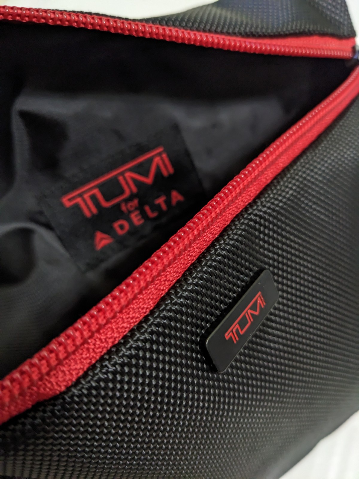 New Tumi Delta Black Zip Pouch Travel Case Red Zipper Cosmetic Toiletries Bag
