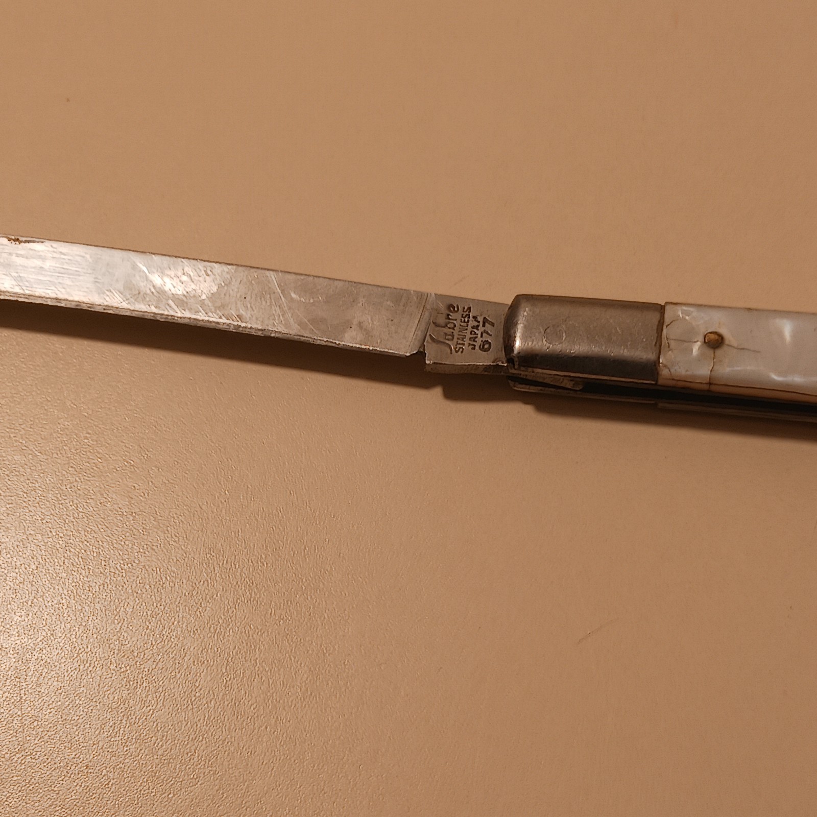 Sabre Stainless Steel Japan 677 Folding Fruit Melon Knife White Celluloid Handle