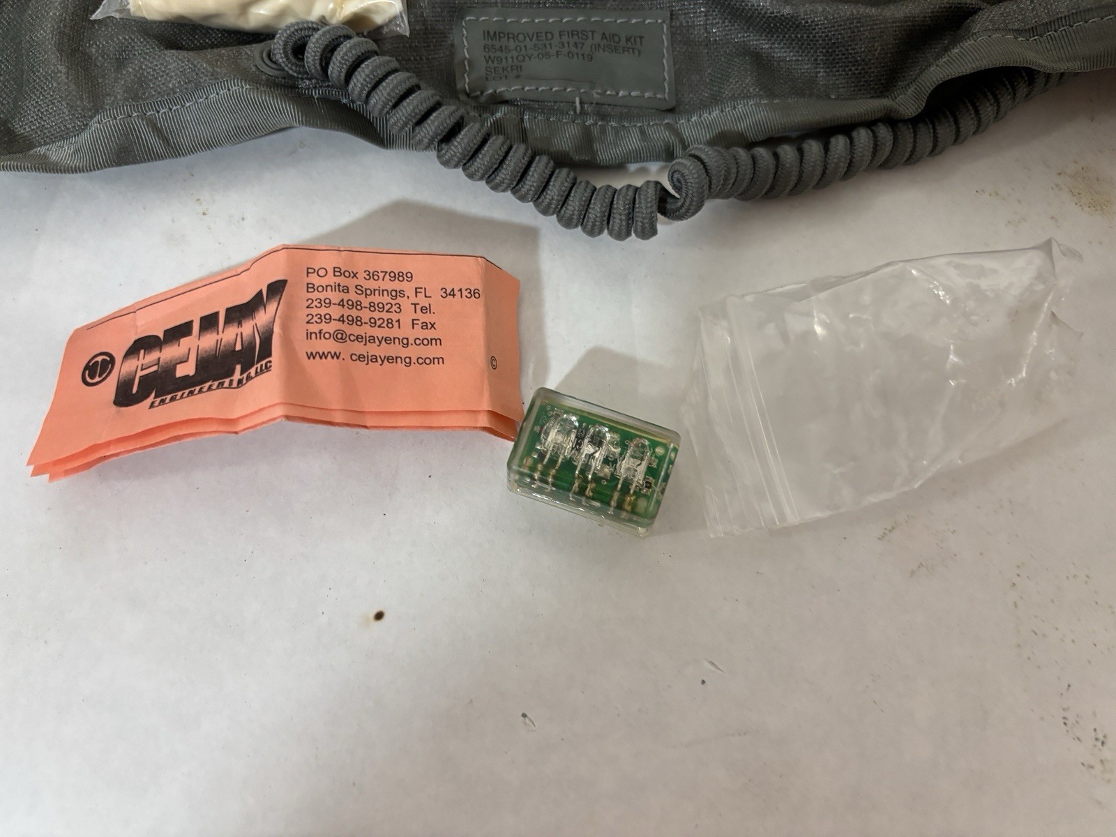 US Military Improved First Aid Kit IFAK w Parts and IR Beacon