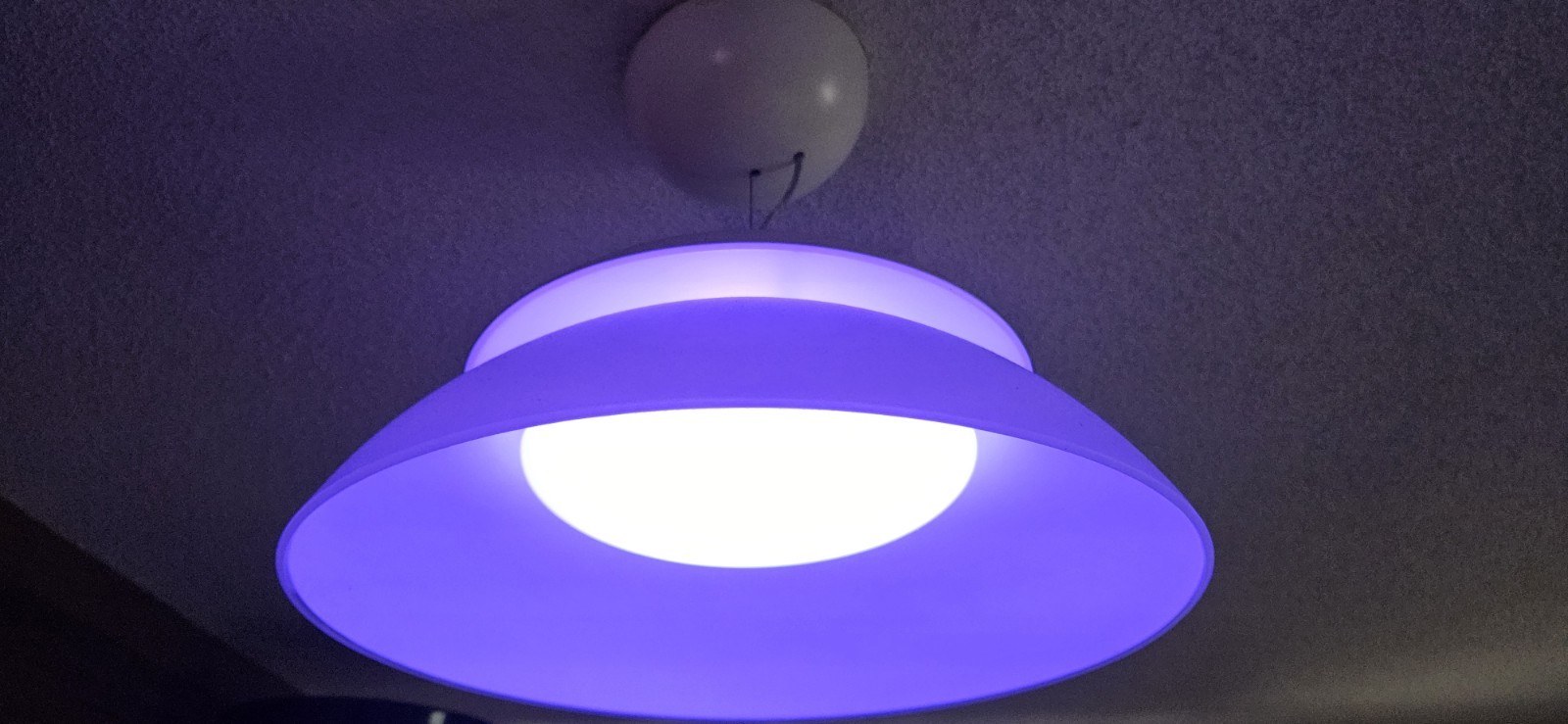 The Philips Hue Beyond White and Color Ambiance Smart Pendant Light.