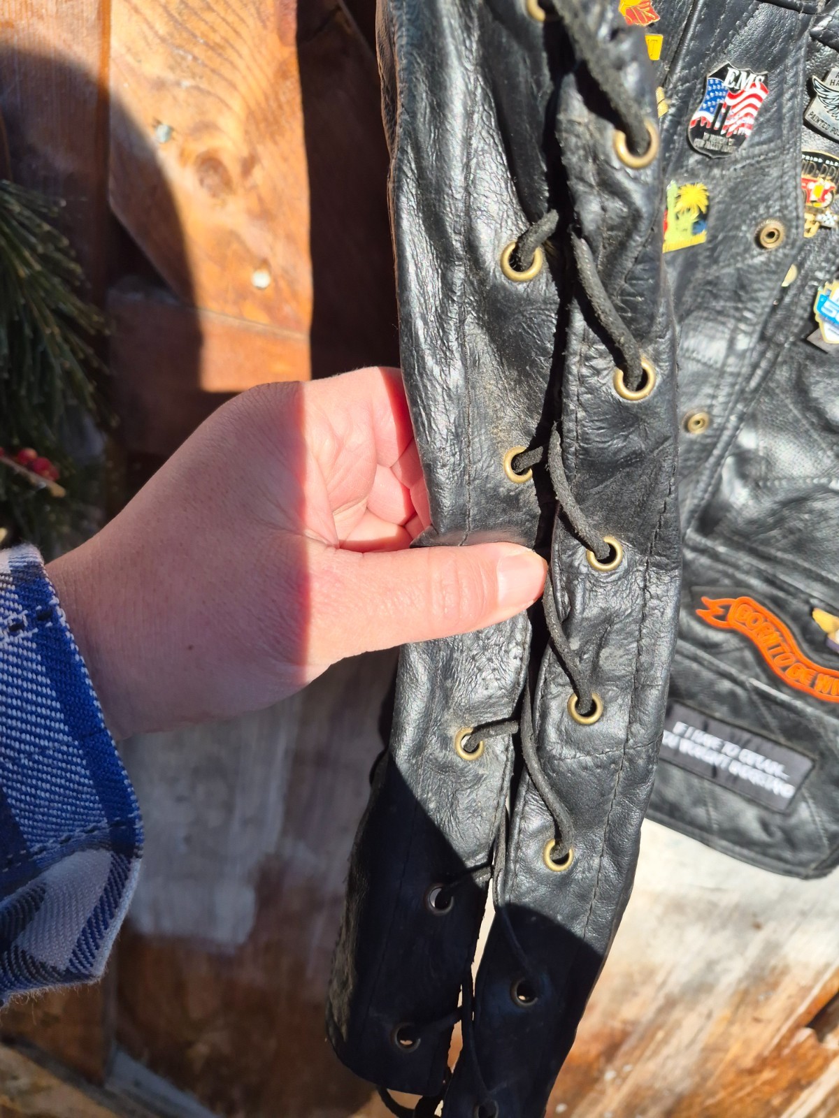 Vintage harley hog leather vest filled with pins and has patches 2xl