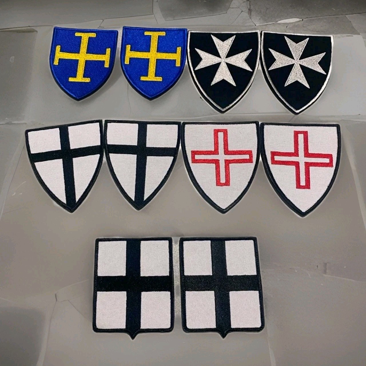 Chevron with the symbol of the Hospitallers of St. Thomas of Canterbury in Acre.