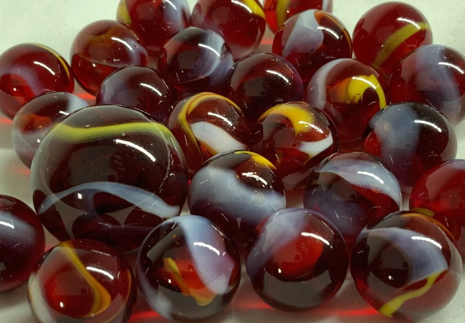 25 Glass Marbles FIRE Translucent Clear Red White/Yellow Swirl Pack Shooter