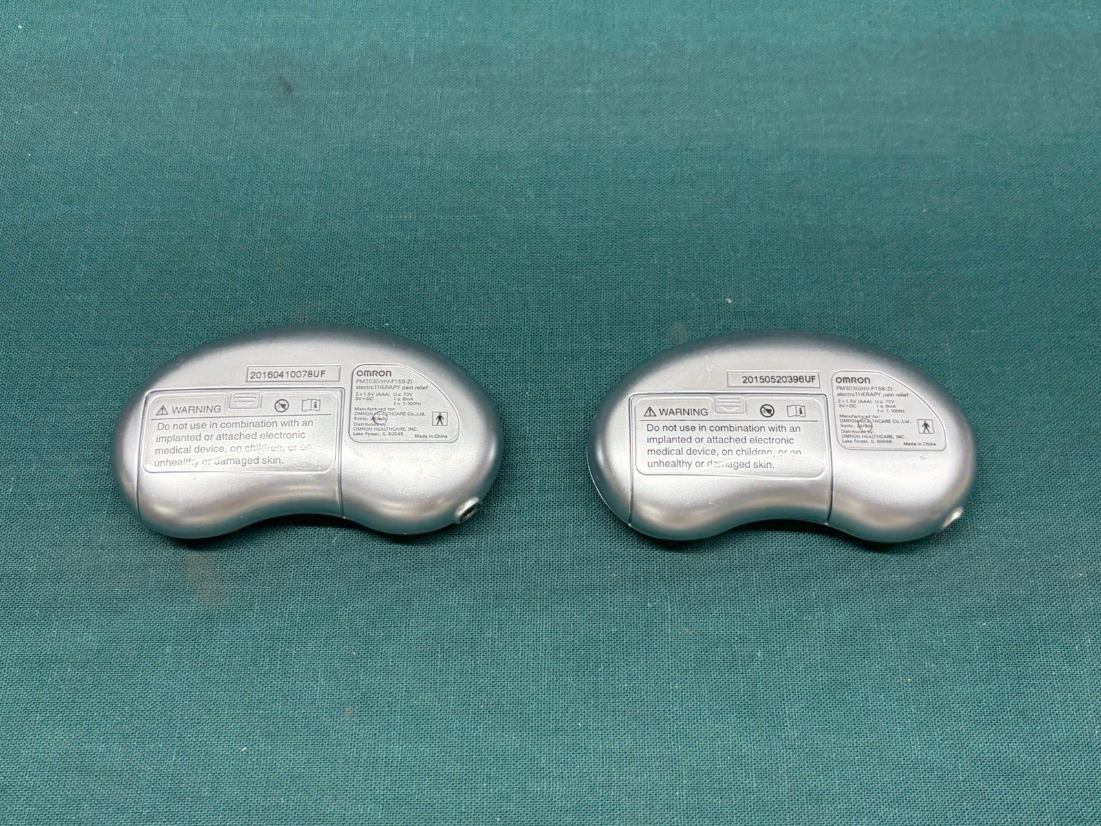 Pair of Omron PM3030 ElectroTherapy Pain Relief TENS Unit HV-F158-Z –Tested (5M)