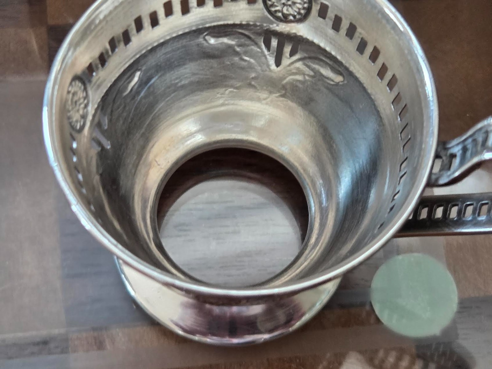 A Pair of Sterling Silver Teacups with 6 Porcelain Inserts