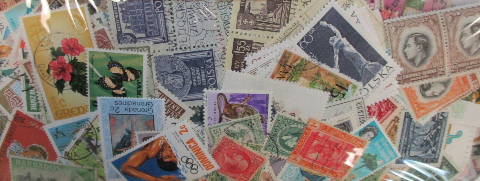 Quality Lot of 1000 Mint/Used Stamps ~ No soaking required!