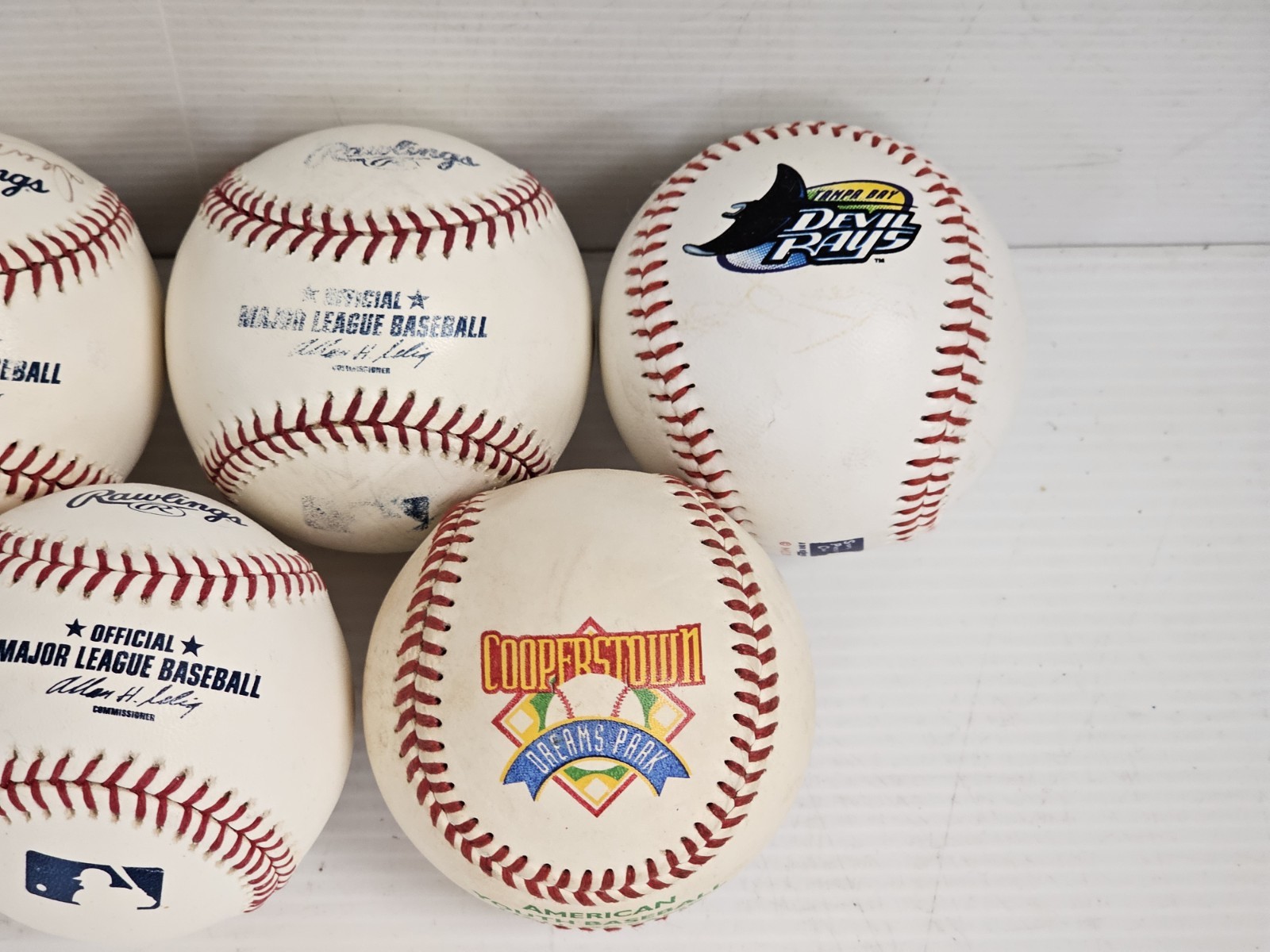 Mixed Lot of 7 Baseballs MLB Official Rawlings Devil Rays Cooperstown