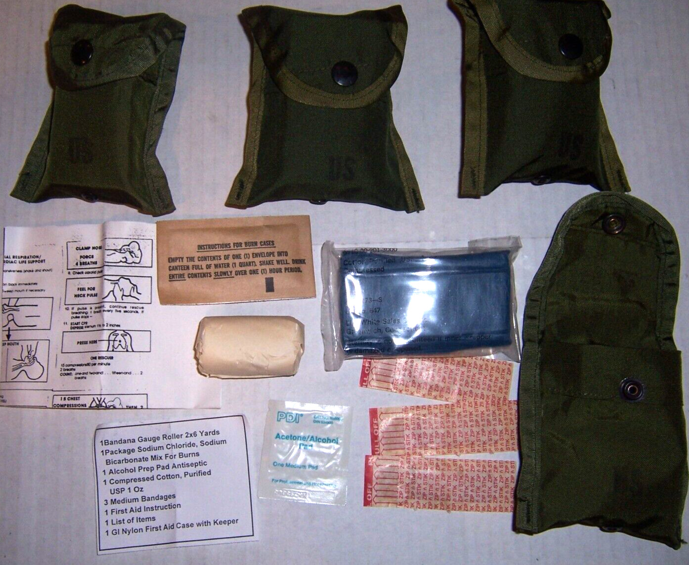 Four New complete Nylon First aid kit US military genuine GI surplus small