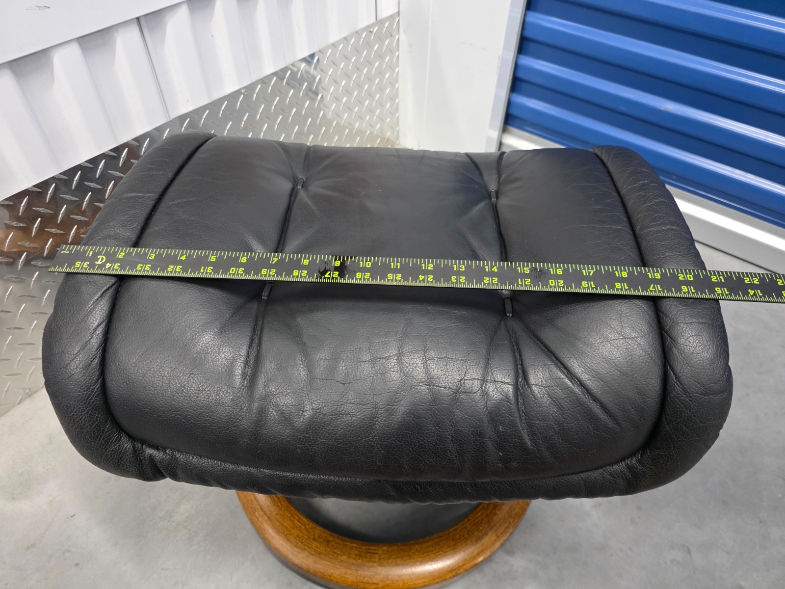 Ekornes Stressless Black Colored Leather Ottoman | Teak Stained Wood Base