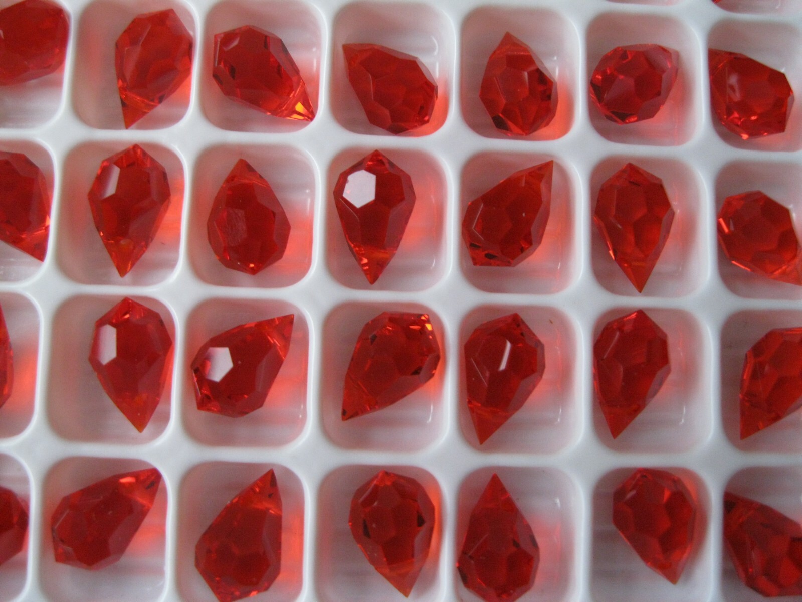 24 Preciosa Machine Cut Drop Pendants 6x10mm Light Siam