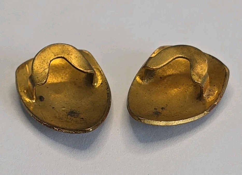 PAIR OF ANTIQUE ART NOVEAU BRASS FLEUR DE LIS SHIELD BUTTON COVERS