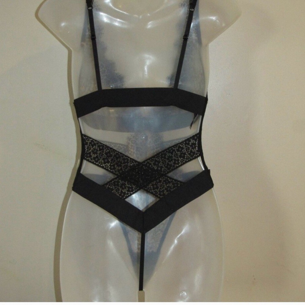 Victorias Secret Black Lace Thong Bodysuit. Size large.