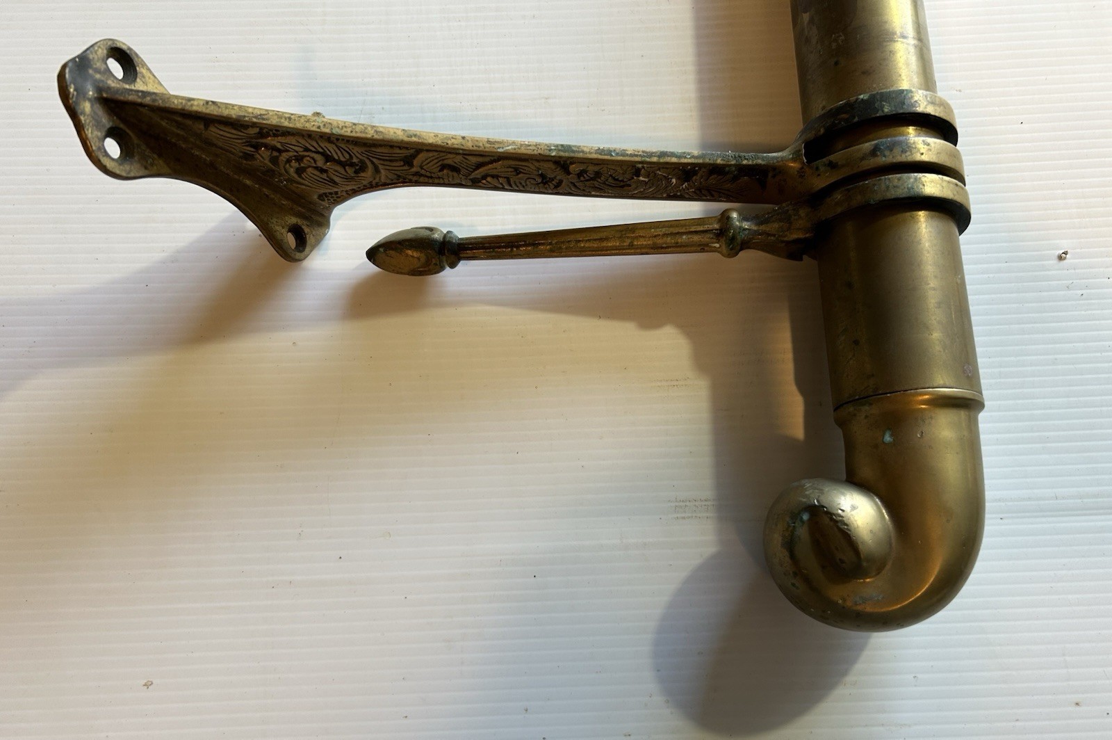 ANTIQUE BRASS BAR END RAIL AND FANCY DECORATED RAIL HANGERS