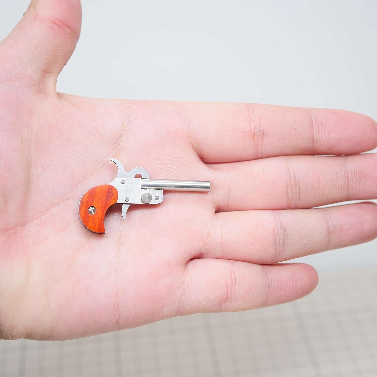 Miniature 2mm Pinfire Gun Key chain Model with Bullet Shells berloque PISTOL