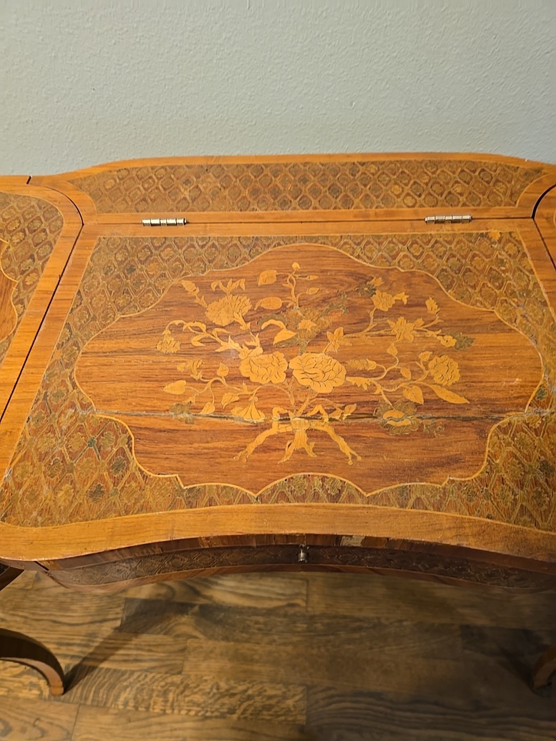 "Antique vanity table from the late 1800s with intricate inlay & a hidden mirror