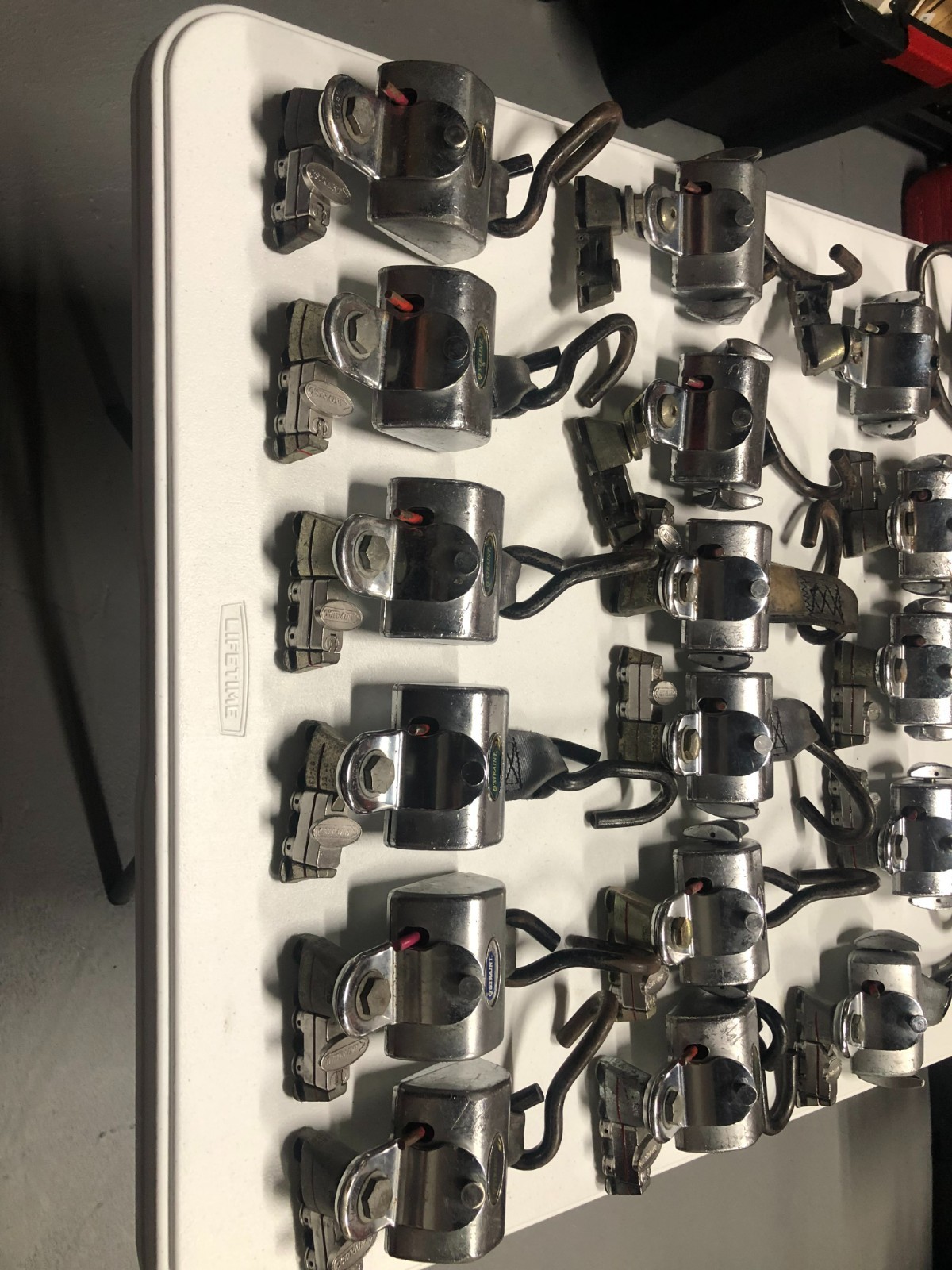 Q'Straint Wheelchair Securement tie Down Retractors.