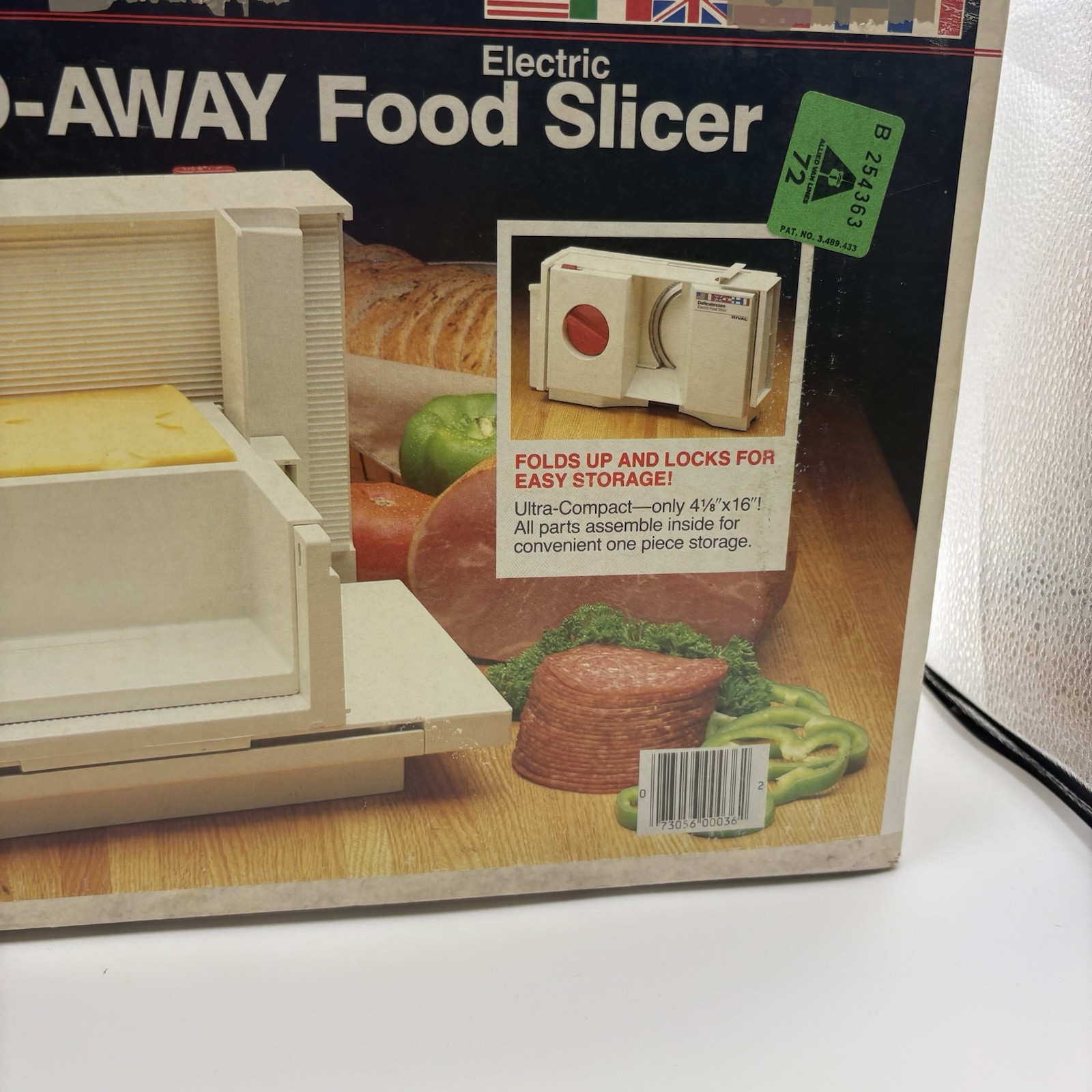Rival 1044 Delicatessen Fold-Away Electric Food Slicer-Sliding Tray