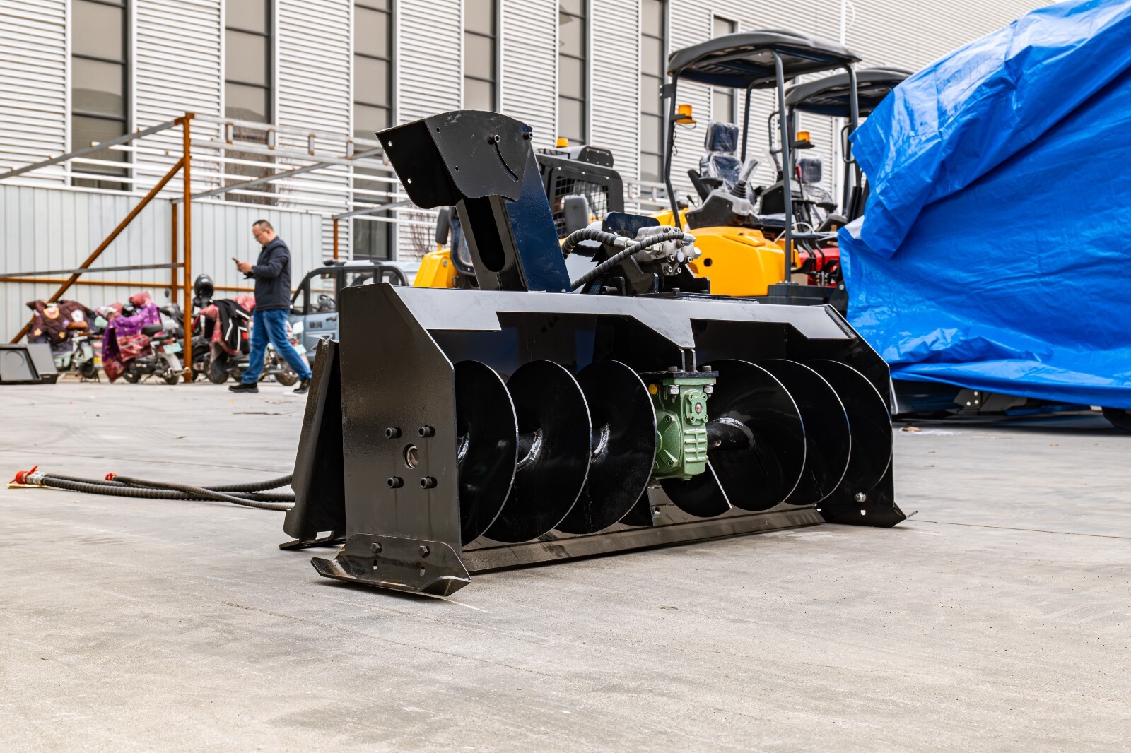 Bobcat-compatible snow blower Efficient flexible snow removal attachment