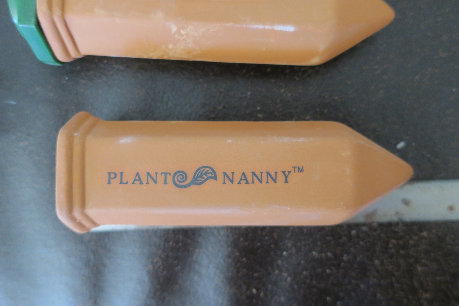 6 Terracotta PLANT NANNY Watering Spikes with 2L adapters.