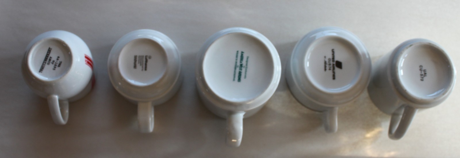Lot 280, set of 5 various airline coffee cups, used