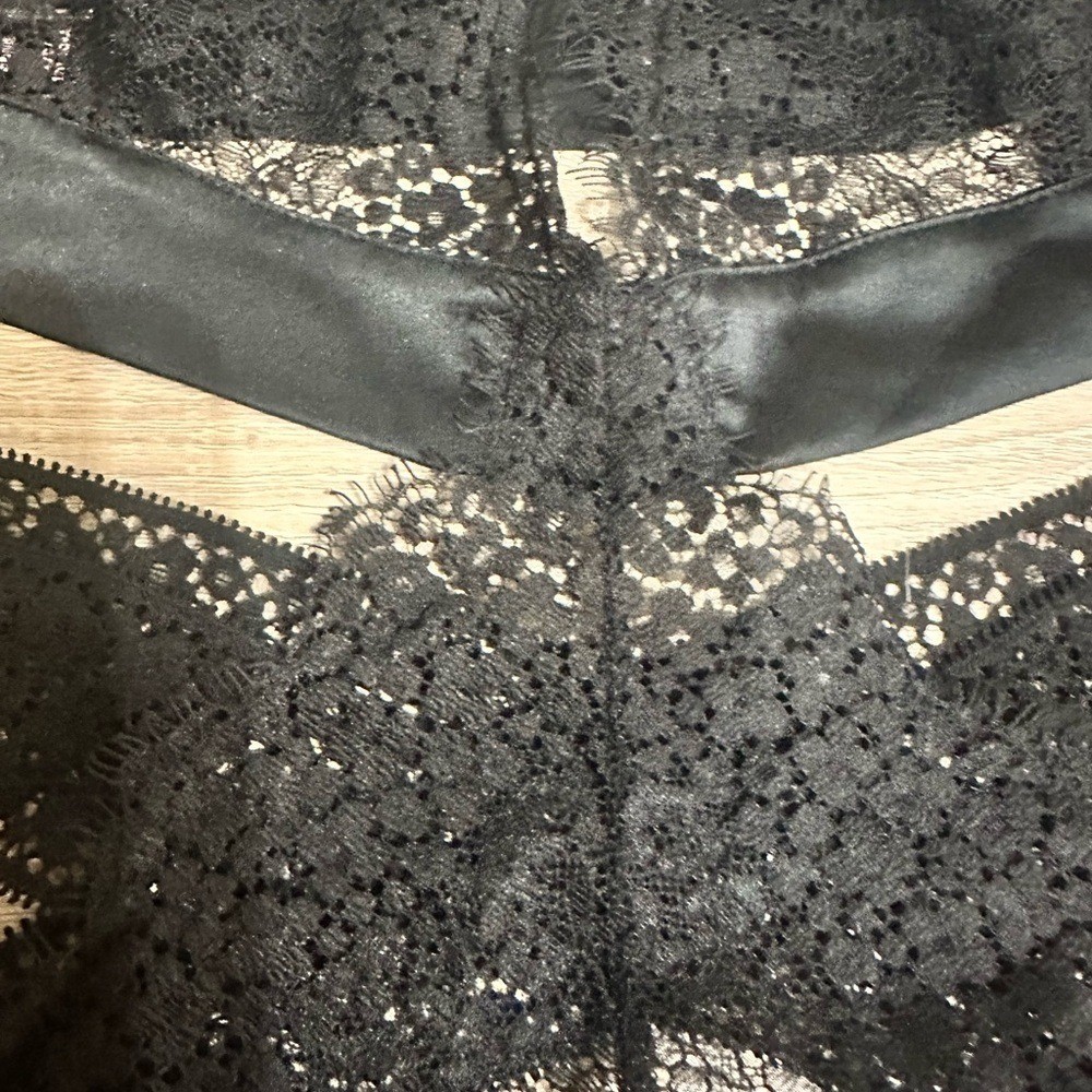 Victorias Secret Black Lace Thong Bodysuit. Size large.