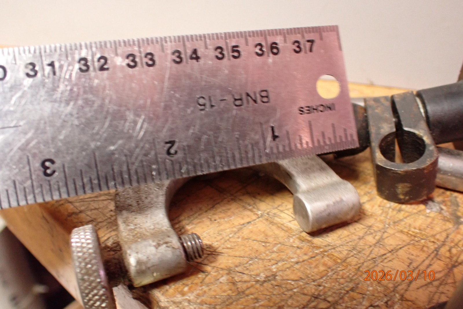 PILE OF BROWN AND SHARPE STARRETT OTHER DIAL INDICATOR ARMS SWIVEL BRACKETS PART