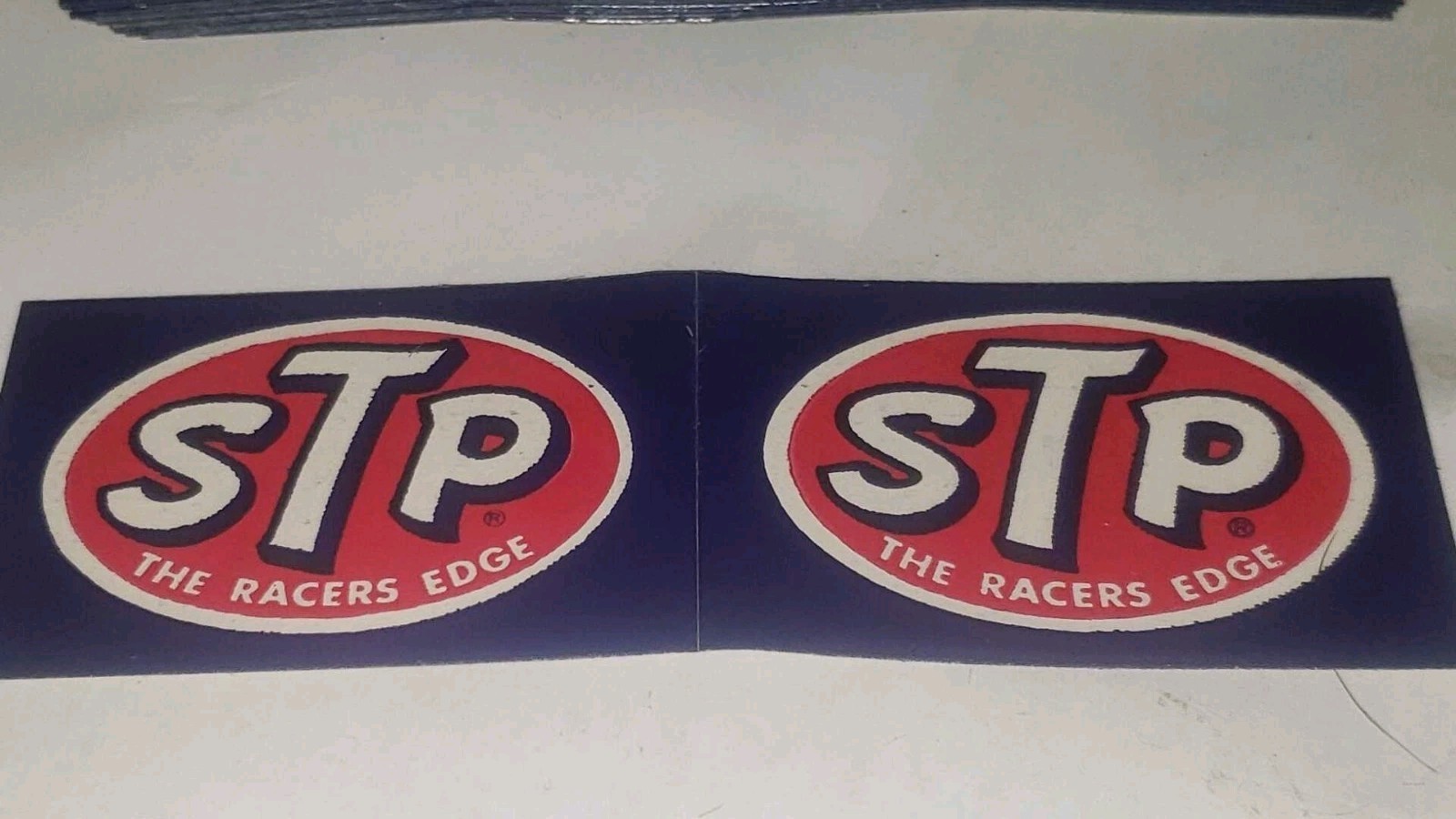 (2) Vintage STP “The Racer’s Edge” Paper-Backed Stickers - Small 1.5 X 2.25
