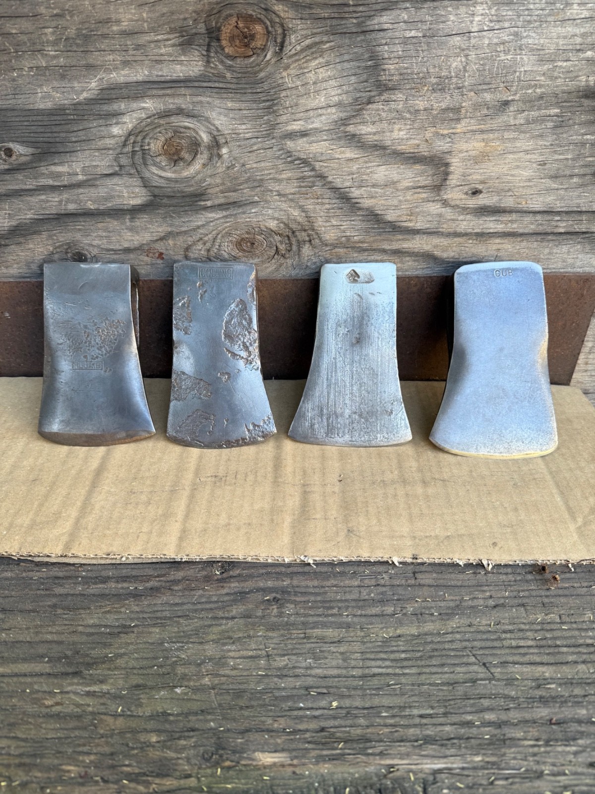 Vintage lot of four 2-1/4 Lb. boys size axe heads.