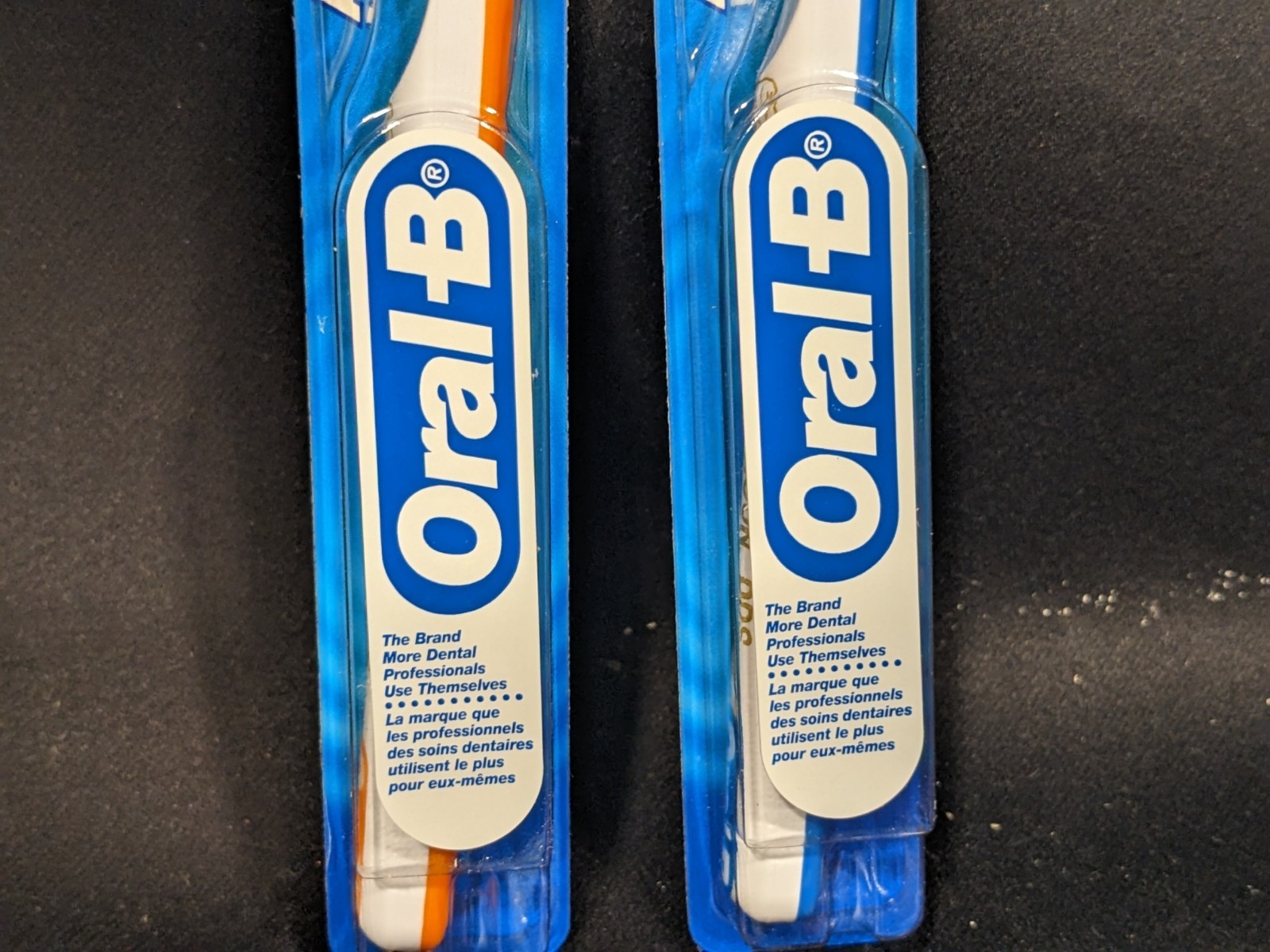 Box of 12 New OS Oral-B Advantage Soft 35 toothbrushes blue green orange yellow