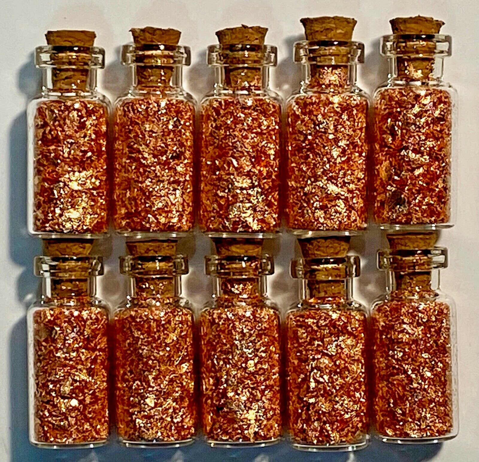 9 Bottles of Large Real Copper Flakes ..... Lowest price on the Net