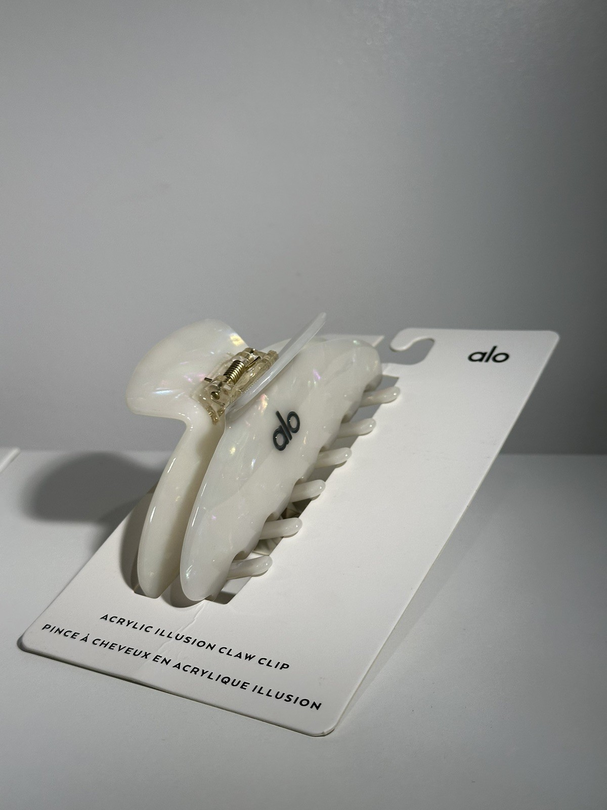 Alo Yoga white acrylic illusion hair clip