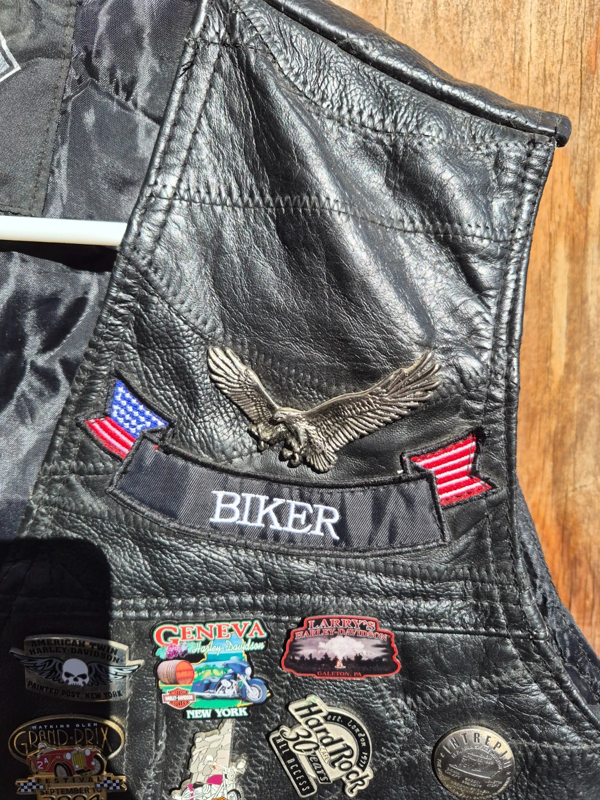 Vintage harley hog leather vest filled with pins and has patches 2xl