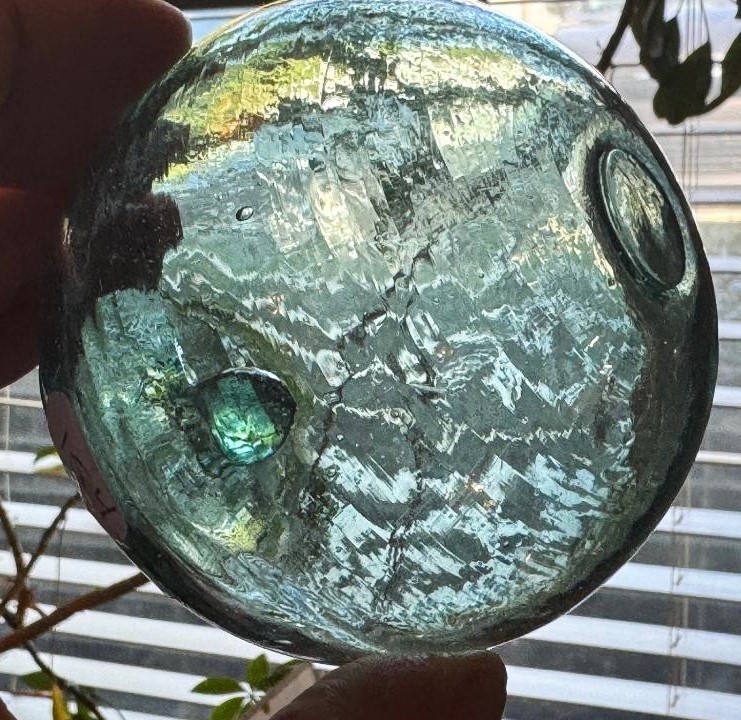 Crude aqua-green glass float, 3 1/4 inches diameter
