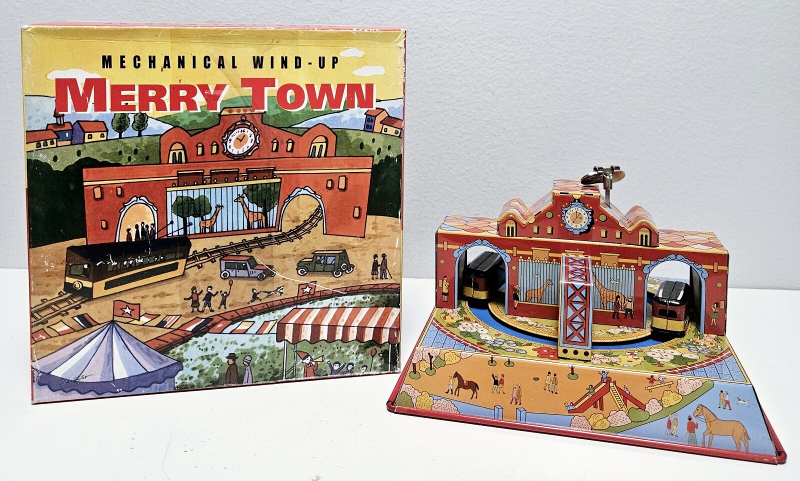 Merry Town Mechanical Wind-Up Tin Toy with Original Box by Ha Ha Toy