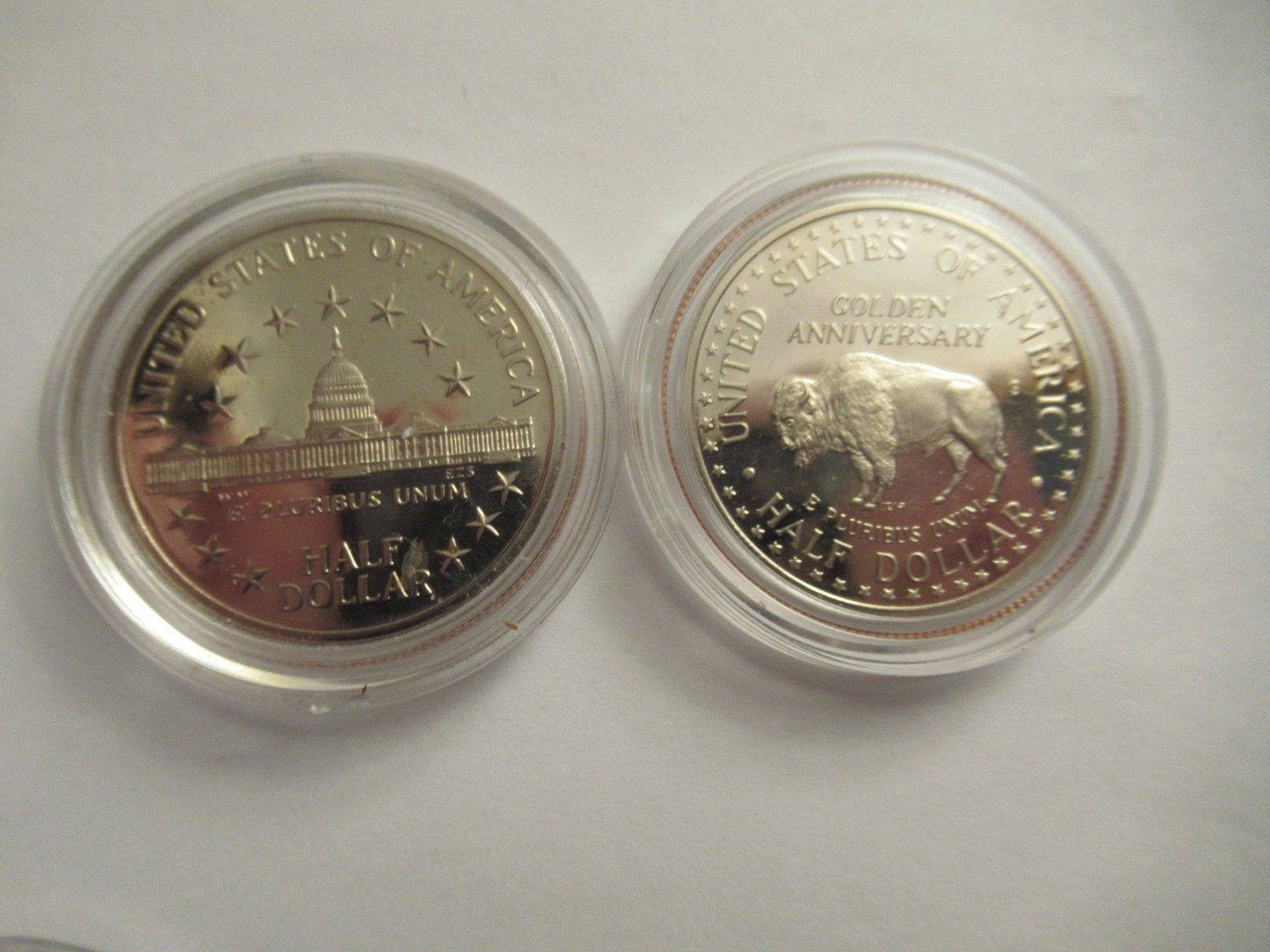 Lot of 11 US Clad half dollars, mix dates, w/ capsules