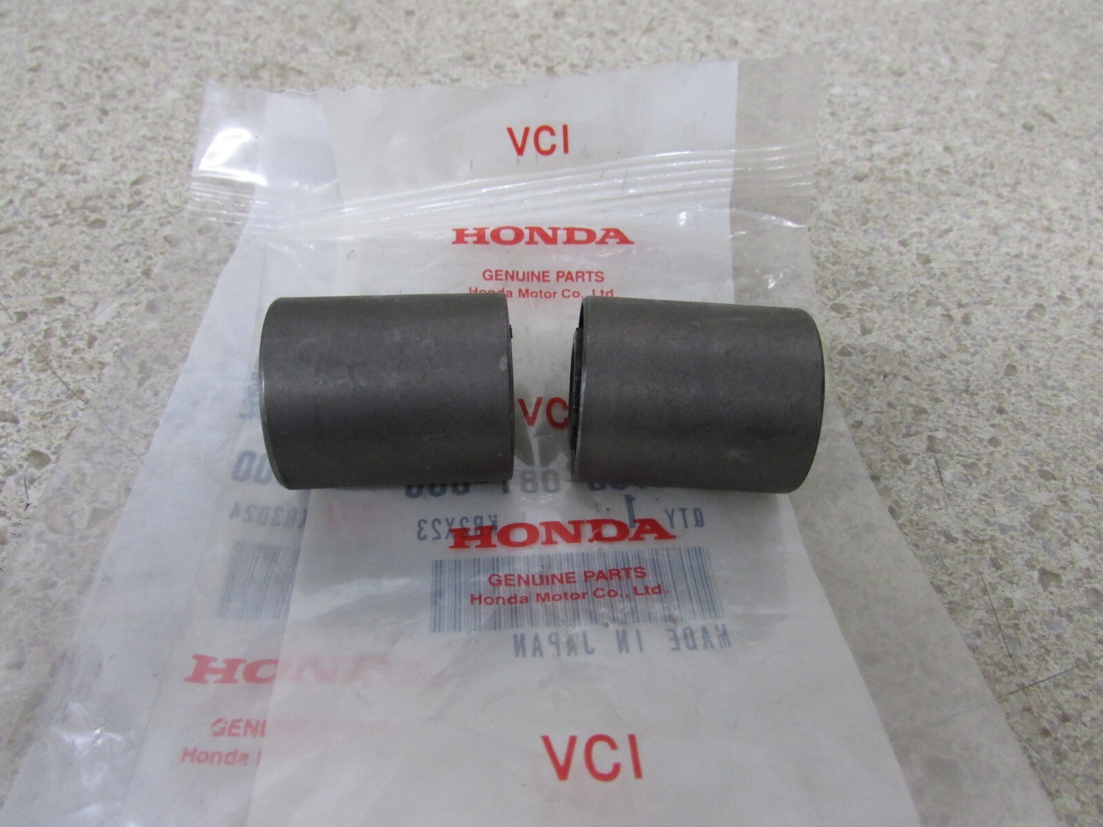 HONDA CRF50F XR50R XR70R OEM SWINGARM PIVOT RUBBER BUSHINGS PAIR 52108-081-000