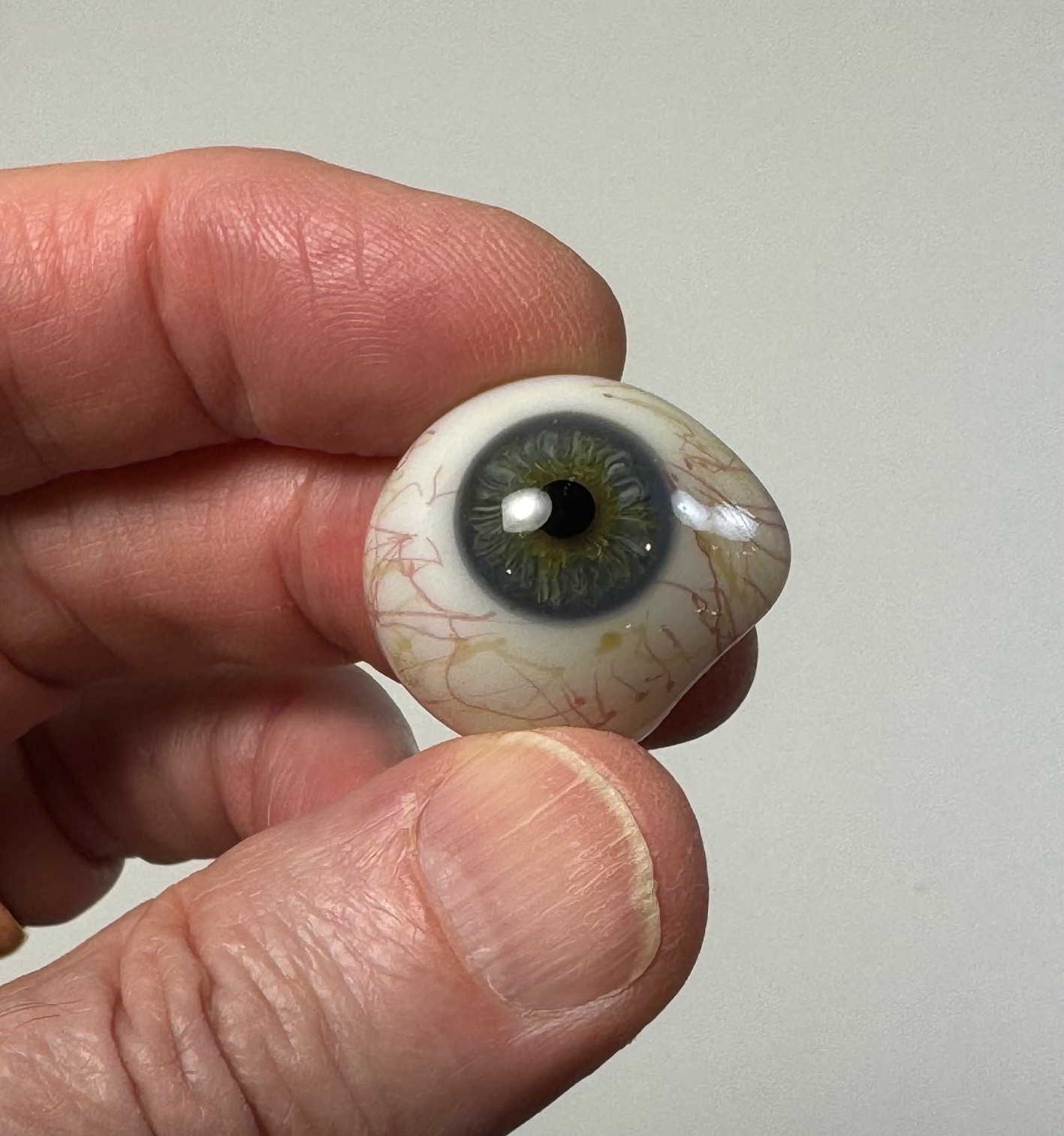 Antique German hand-blown human prosthetic glass eye.  Bloodshot eye. Blue.
