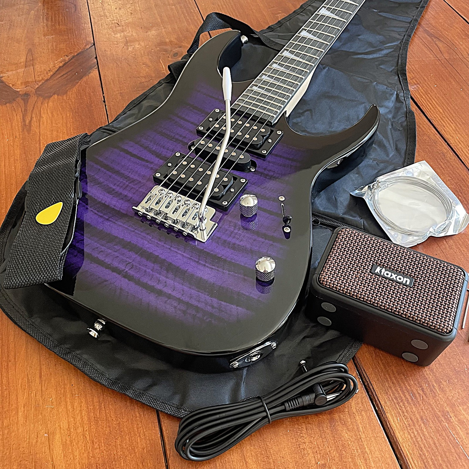 Full-Size Purple Electric Guitar and 5-Watt Amp Starter Package with Accessories