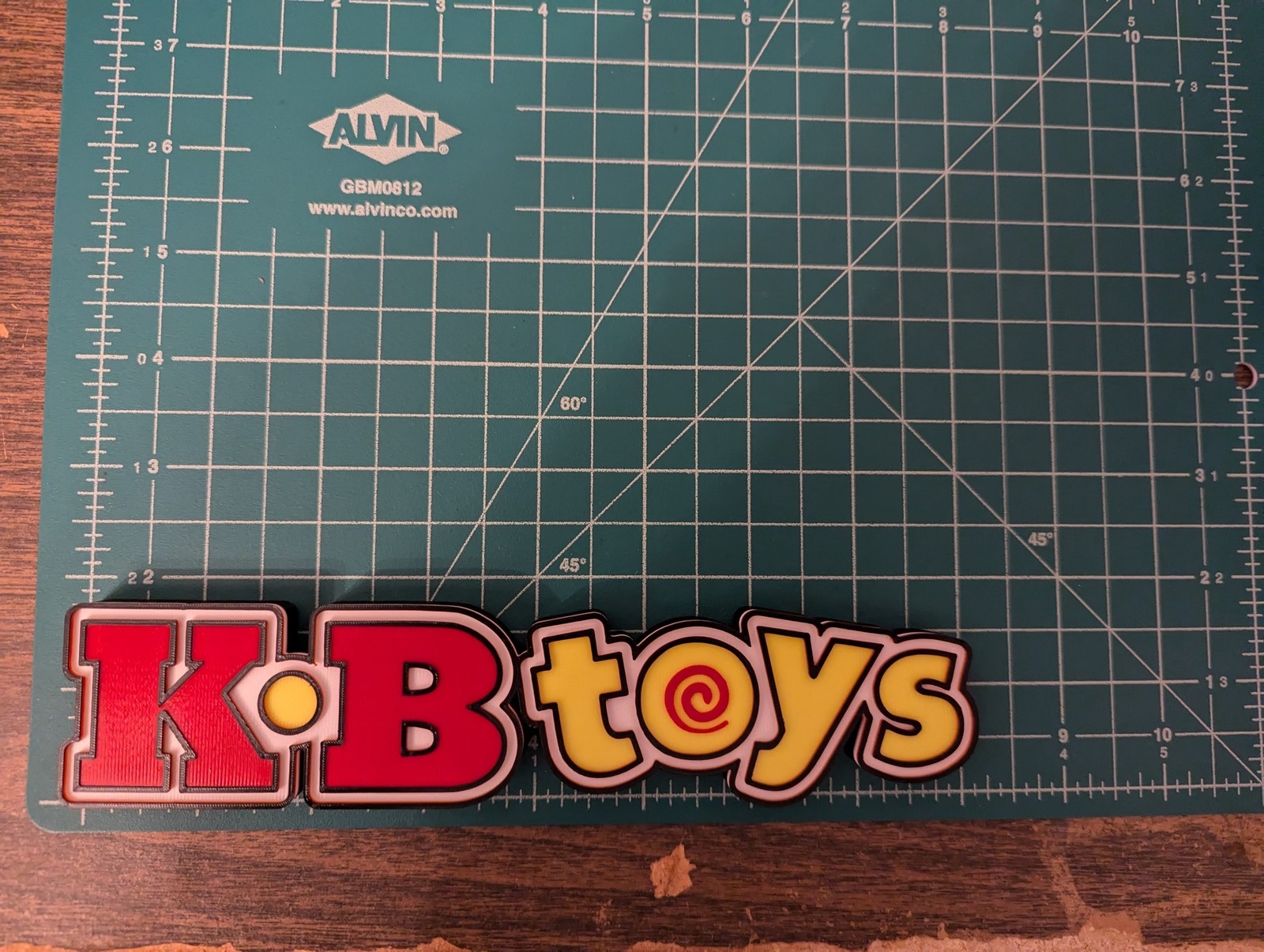 KB Toys logo sign 3D printed display shelf wall art