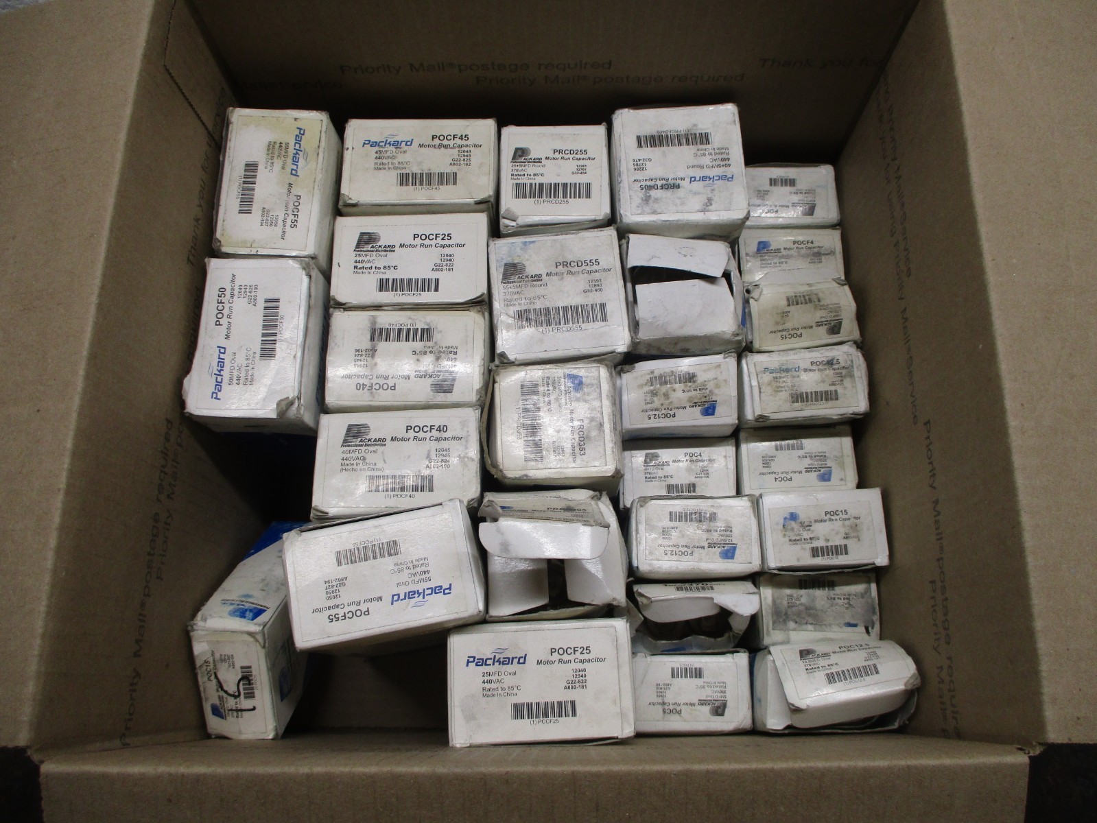 LOT OF 29 NOS PACKARD MOTOR RUN CAPACITORS PRCFD405 POCF40 POC4 HVAC