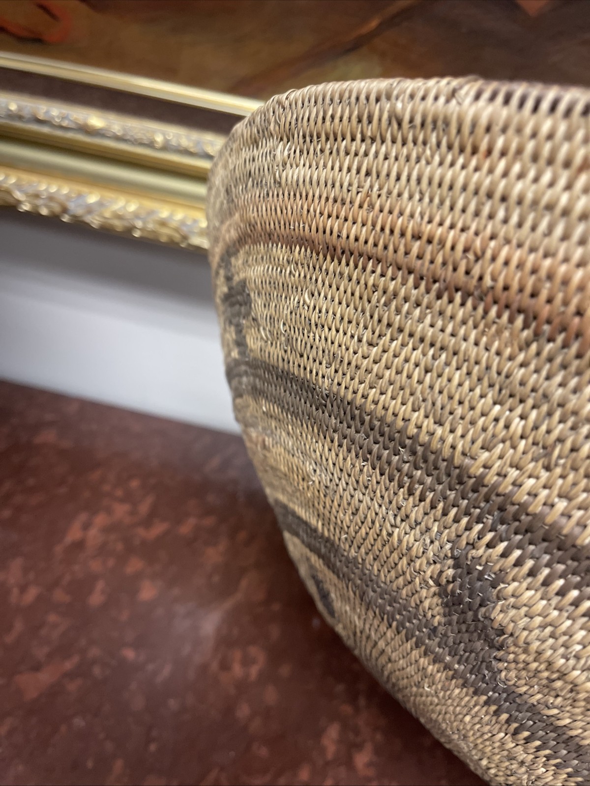 Woven Apache pictorial 17 1/4” basket with geometric and symbolic designs.